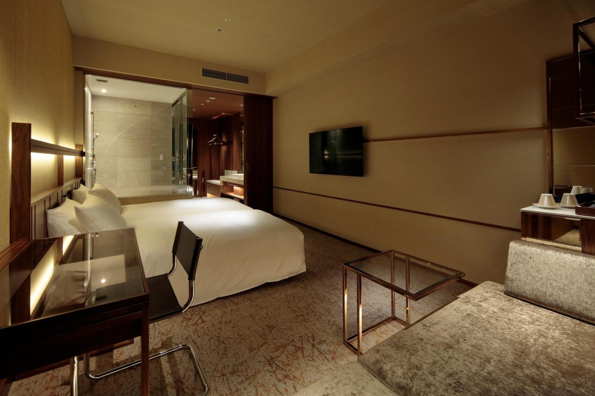 Candeo Hotels Osaka The Tower Quarto foto A room at the hotel