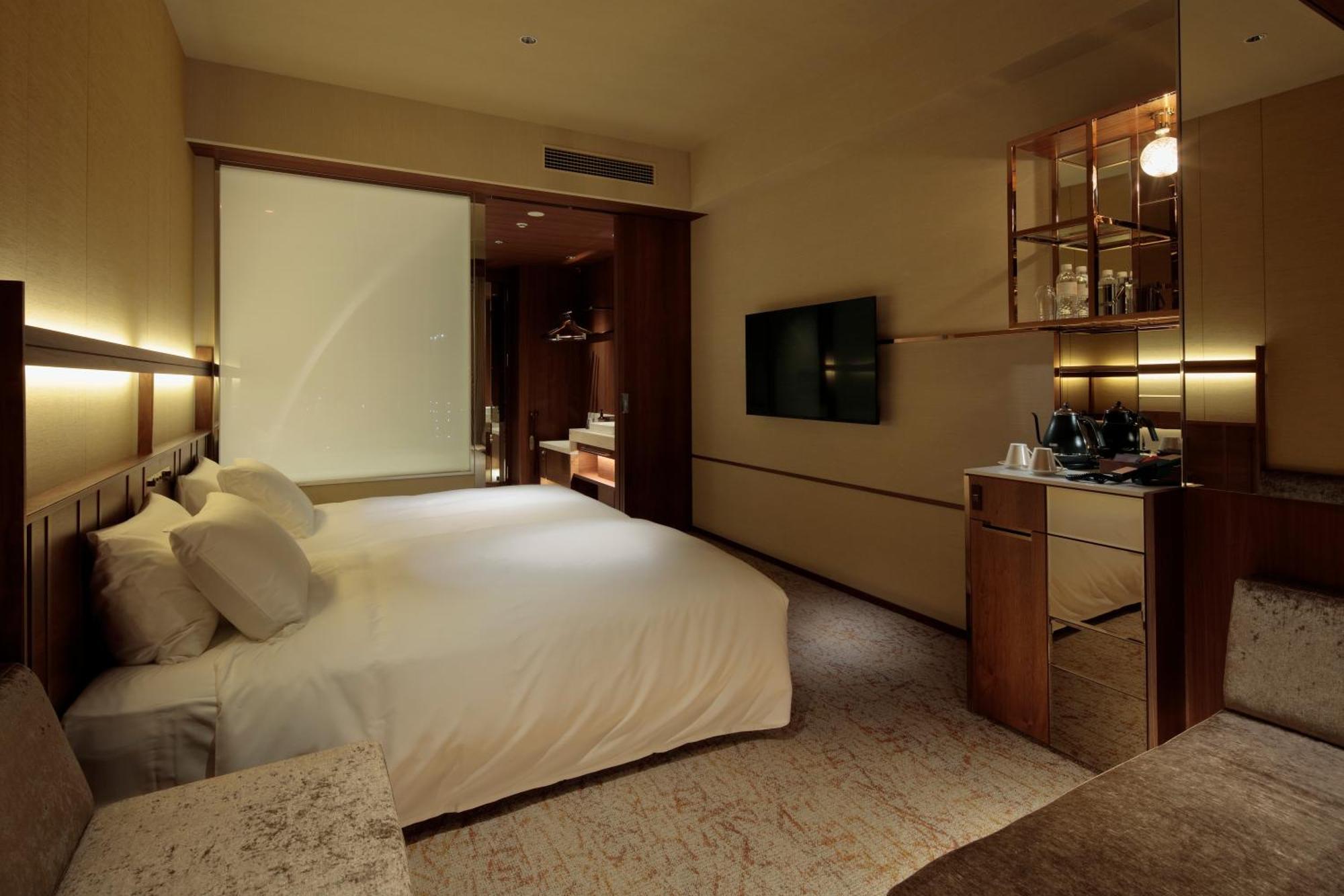 Candeo Hotels Osaka The Tower Quarto foto A room at the hotel