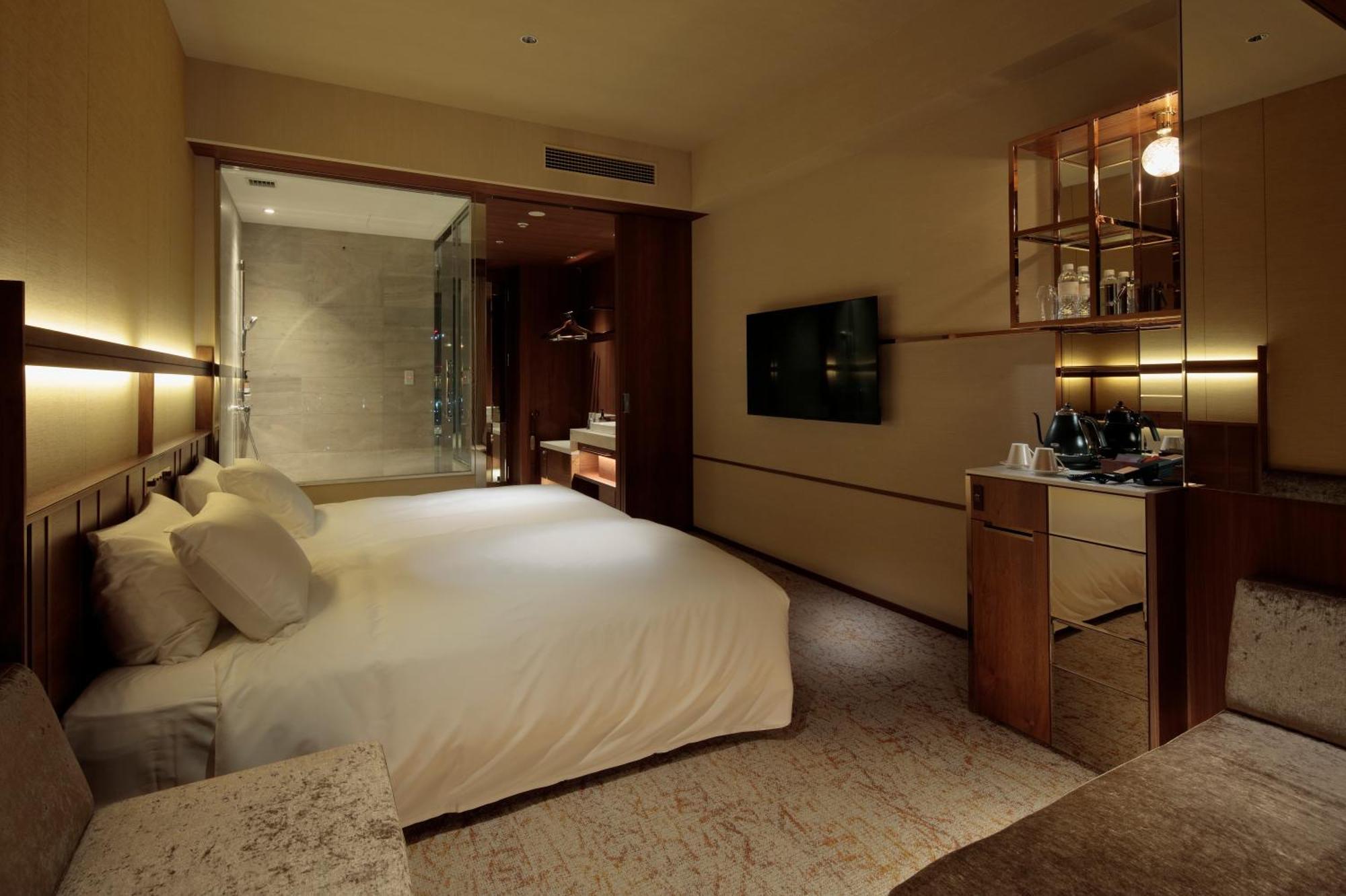Candeo Hotels Osaka The Tower Quarto foto A room at the hotel